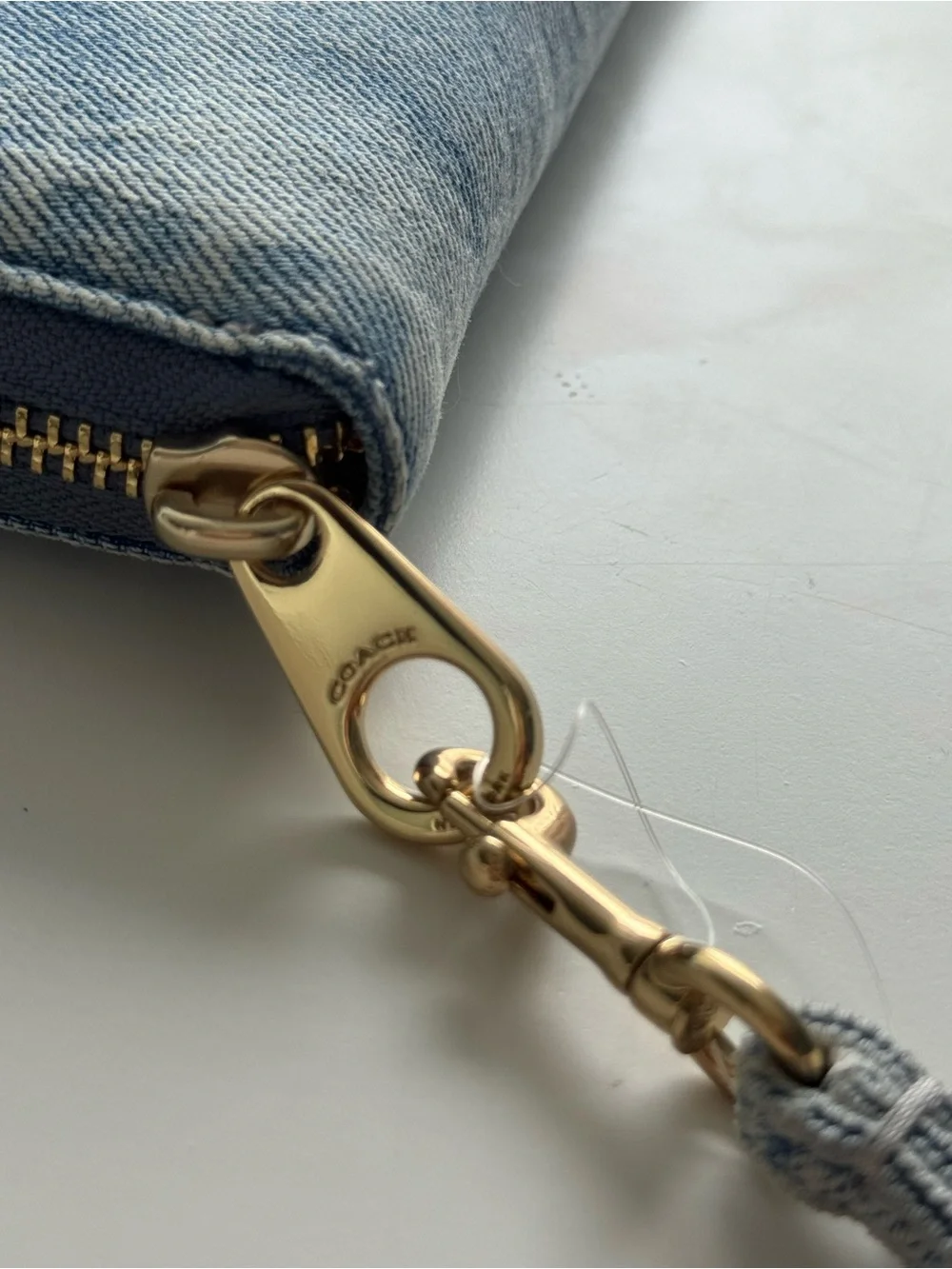 Coach Denim Zip-Around Wristlet in Light Blue with Gold Accent